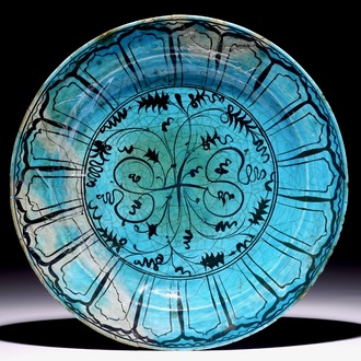 An Islamic turquoise and black Kubachi dish, Iran, 17th C.