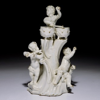 A white Delft group of putti playing music, probably German, 18th C.