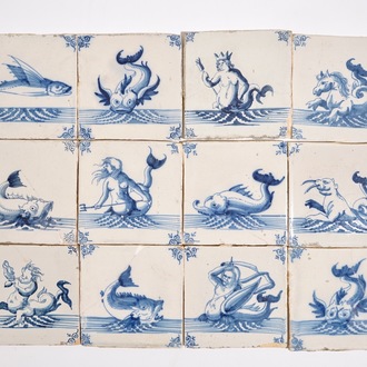 Twelve Dutch Delft blue and white seacreature tiles, 17th C.