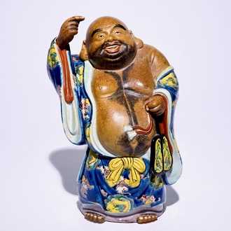 A large Japanese Kutani figure of Buddha Hotei, Meiji, 19th C.