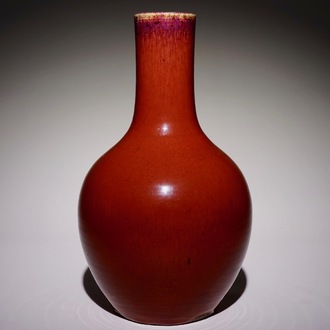 A Chinese monochrome sang-de-boeuf-glazed tianqiu ping bottle vase, 19th C.