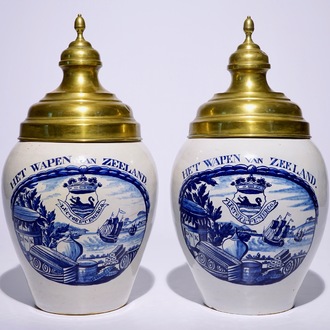 An exceptional pair of Dutch Delft blue and white tobacco jars "Het Wapen van Zeeland", 18th C.
