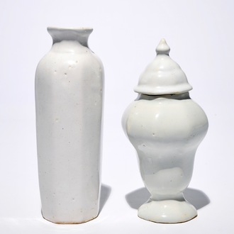 A white Dutch Delft rouleau vase and a vase with cover, 17/18th C.