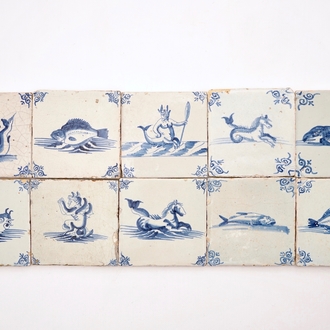 Ten Dutch Delft blue and white seacreature tiles, 17th C.