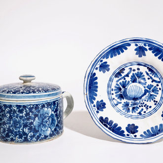 A Dutch Delft blue and white butter tub and cover and a small fluted plate, 18th C.