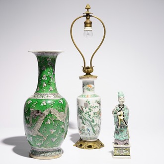 A Chinese green ground dragon vase, a small rouleau vase and a verte biscuit figure, 19th C.