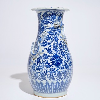 A Chinese blue and white lotus scroll vase, 19th C.