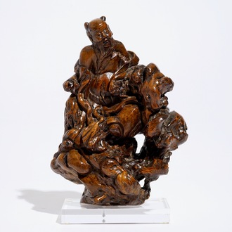 A Chinese carved root wood immortal group, 17/18th C.