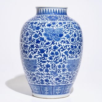 A Chinese blue and white peony scroll vase, 19th C.