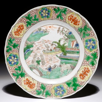 A Chinese famille verte plate with a fluvial landscape, Kangxi