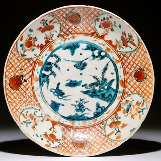 A Chinese Swatow charger with ducks in a pond, Ming