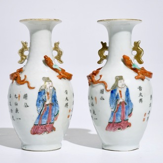 A pair of Chinese famille rose Wu Shuang Pu vases, 19th C.