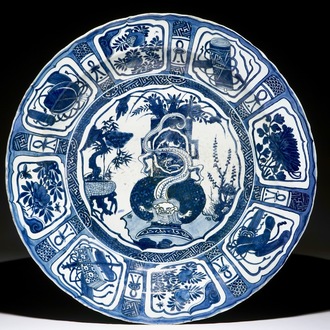 A very large Chinese blue and white kraak porcelain charger with a dragon, Wanli