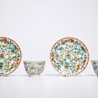 A pair of Chinese famille verte cups and saucers, Kangxi