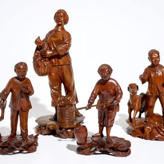 Four Chinese carved wood figures of working class people, Cultural Revolution