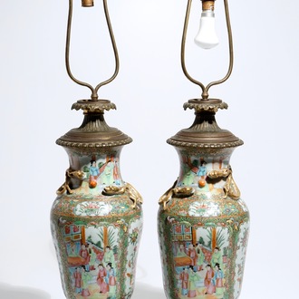 A pair of bronze-mounted Chinese Canton famille rose vases, transformed into lamps, 19th C.