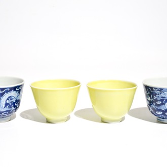 Two pairs of Chinese tea bowls in monochrome yellow and blue and white, 19/20th C.