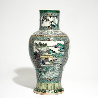 A Chinese verte enamel on biscuit vase with a fluvial landscape, Kangxi