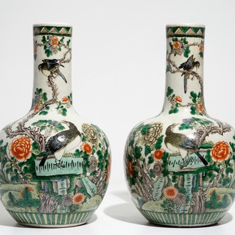 A pair of Chinese famille verte bottle vases, 19th C.