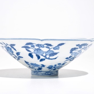 A Chinese blue and white bowl with flowers and fruits, 19th C.