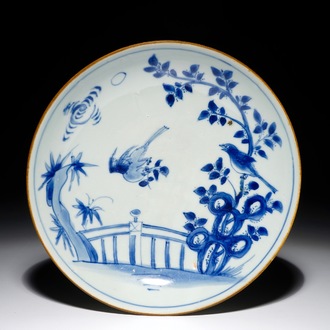 A Chinese blue and white plate with birds in a garden, Shunzhi, Transitional period