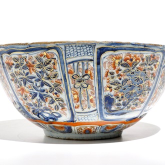 A Chinese clobbered blue and white kraak porcelain bowl with floral design, Wanli