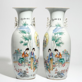 A pair of tall Chinese famille rose vases with figural design and calligraphy, 19/20th C.