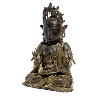 A Chinese bronze model of the seated Guanyin, Ming