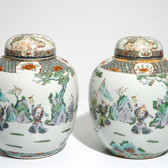 A pair of Chinese famille verte covered jars with figural design, 19th C.