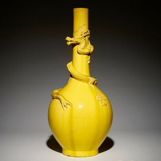 A tall Japanese Awaji monochrome yellow vase with applied dragon, Meiji, ca. 1900