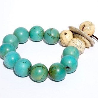 A Chinese bracelet of turquoise and ivory beads, 19th C.