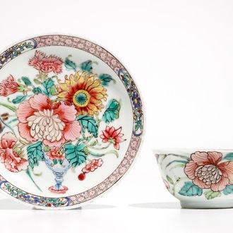 A fine Chinese famille rose cup and saucer with a flowervase, Yongzheng