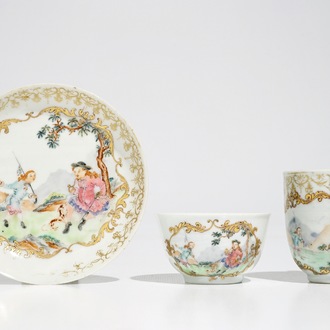 Two Chinese famille rose cups and a saucer with European hunters, Qianlong