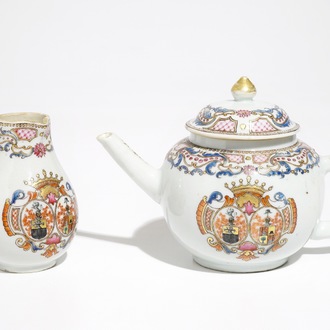 A Chinese famille rose armorial teapot and milk jug, Qianlong