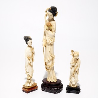 Three Chinese ivory figures on wooden bases, 19/20th C.