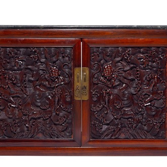 A Chinese two doors cabinet in hongmu and huanghuali with zitan dragon panels, 18/19th C.