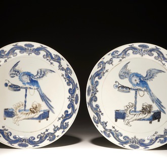 A pair of Chinese Pronk studio eggshell plates with parrots on a perch, Yongzheng/Qianlong