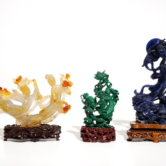 Three Chinese lapis lazuli, agate and malachite figures on stands, 20th C.