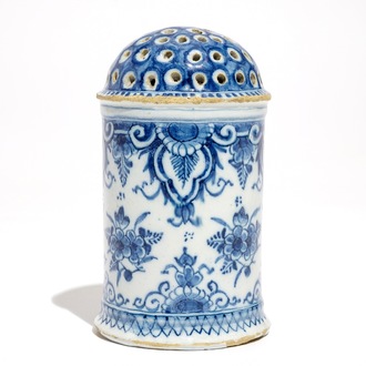 A Dutch Delft blue and white caster, early 18th C.