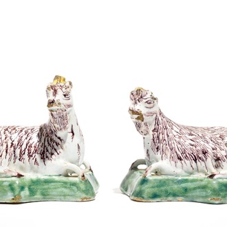 A pair of Dutch Delft polychrome models of goats on a ground, 18th C.