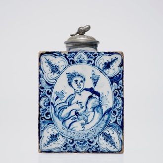 A rectangular Dutch Delft blue and white tea caddy with erotical design, 18th C.