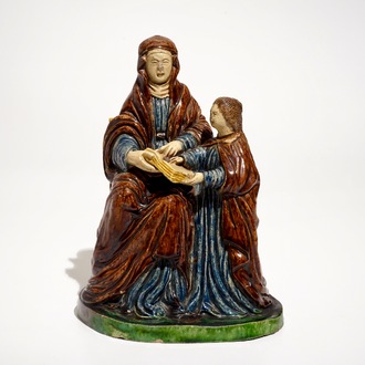 A French Palissy style group of a mother with child, 17th C.