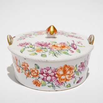 A Dutch Delft petit feu polychrome butter tub and cover with floral design, 18th C.
