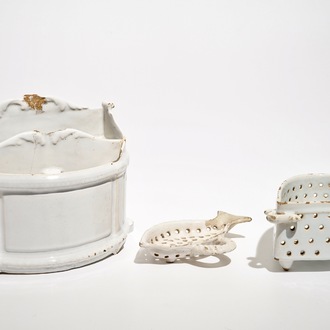 A white Dutch Delft letter holder and two strainers, 18th C.