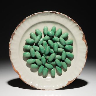 A French faience trompe l'oeil dish with olives, Moustiers, 18th C.