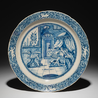 Un plat en faïence de Delft bleu et blanc à sujet religieux d'Amnon et Tamar, daté 1716