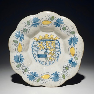 A Dutch Delft polychrome dish with the arms of Orange-Nassau, 2nd half 17th C.