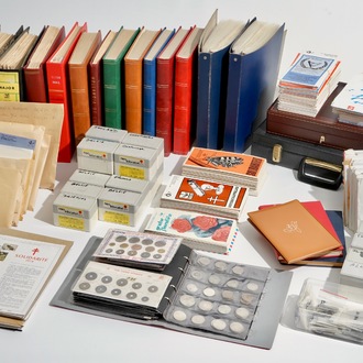 A large collection of stamps and coins, mostly Belgium and Belgian Congo