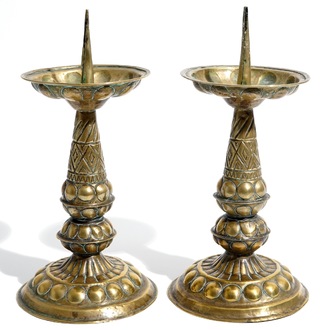 A pair of brass pricket candlesticks, 17th C.