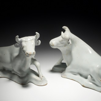 A pair of white Dutch Delft resting cows, 18th C.